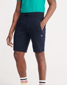 collective shorts with zip pockets