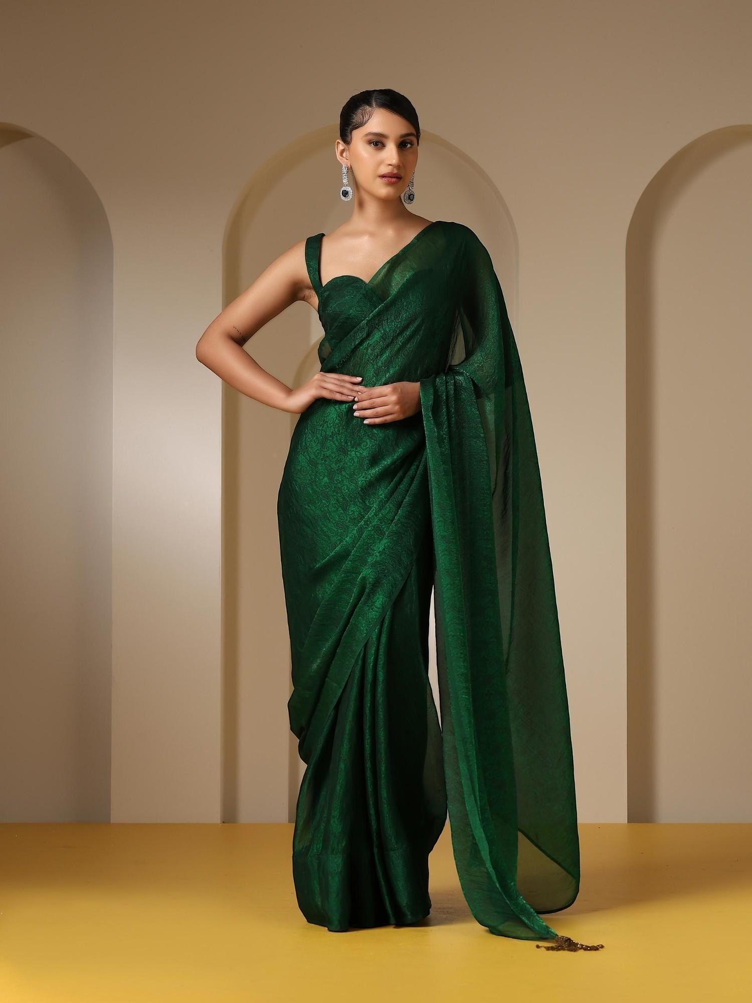 colour me earth green paisley chiffon saree with bronze long pendants