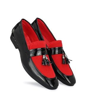 colourblock slip-on shoes with tassels