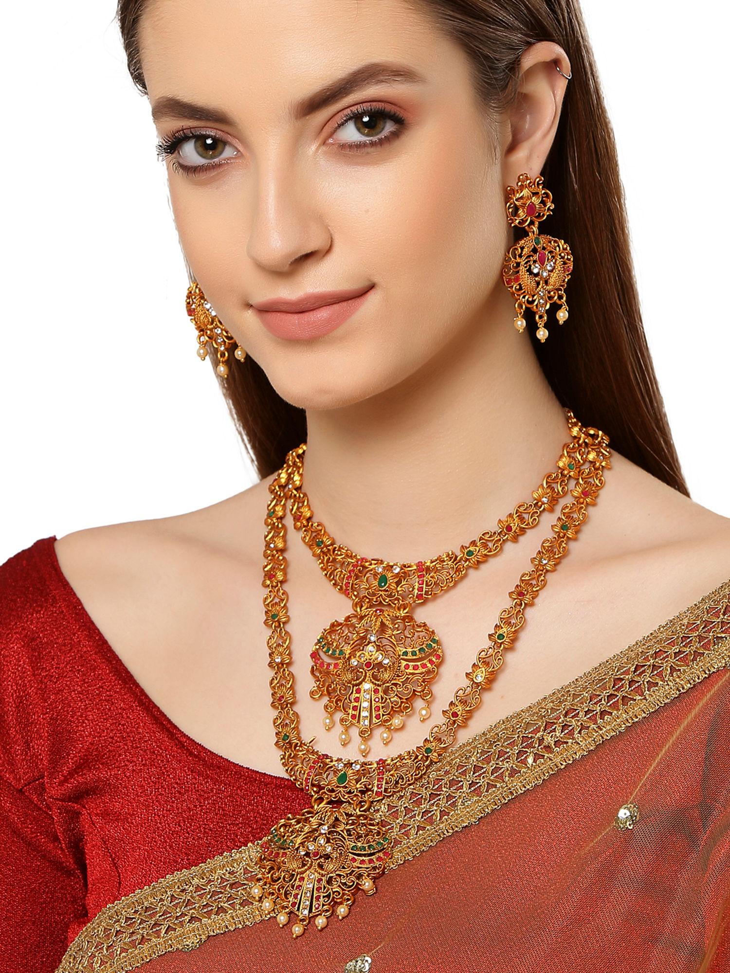 combo of 2 peacock shape gold-plated handcrafted temple jewellery set