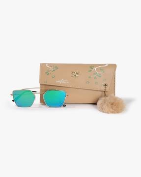 combo of floral print clutch with sunglasses