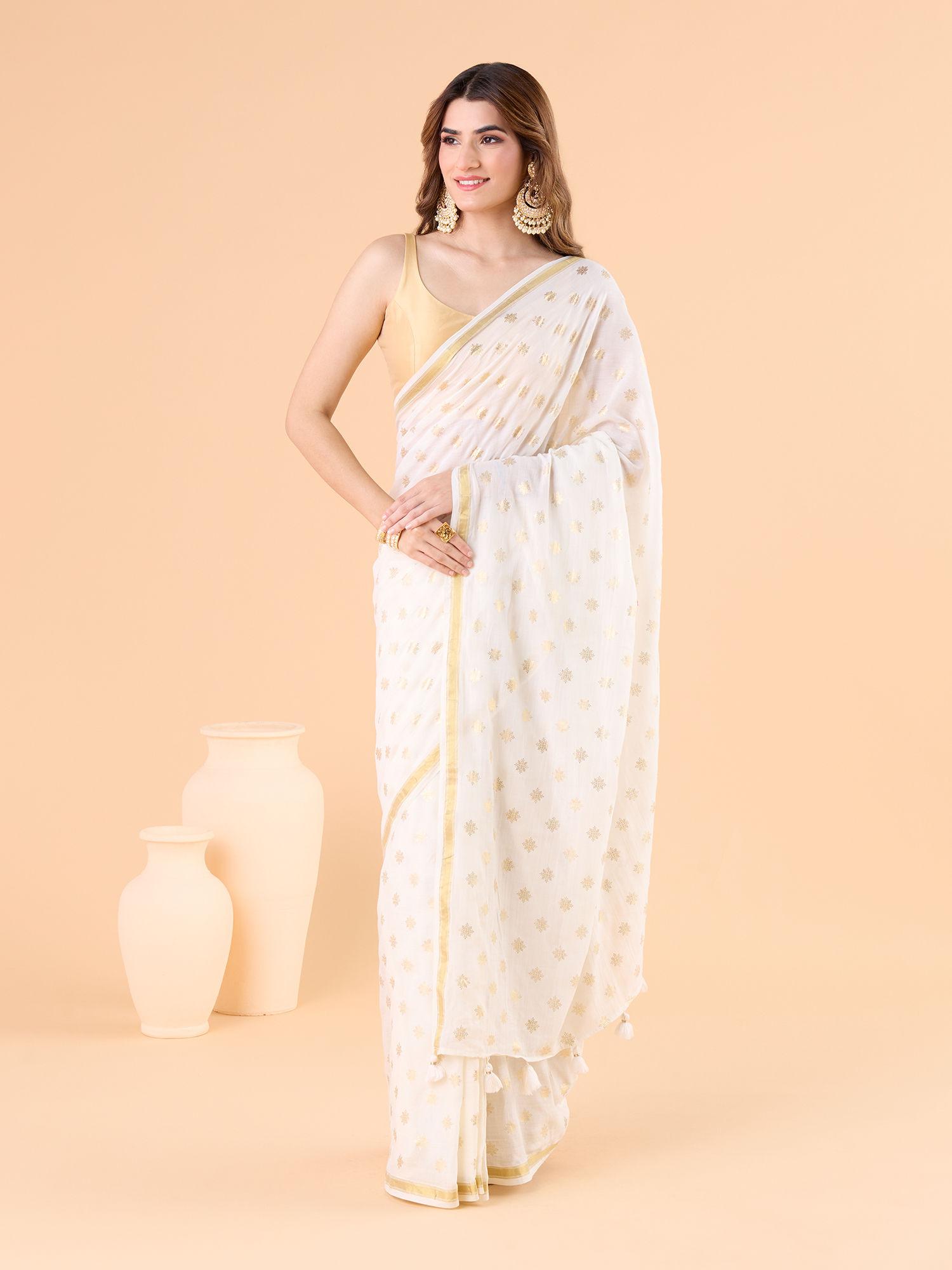 contemporary modal mul polka dots printed and zari border white saree and unstitched blouse