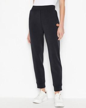 contrast logo patch cuffed trousers with elasticated waist