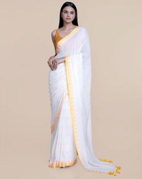 contrast border modal saree with tassels