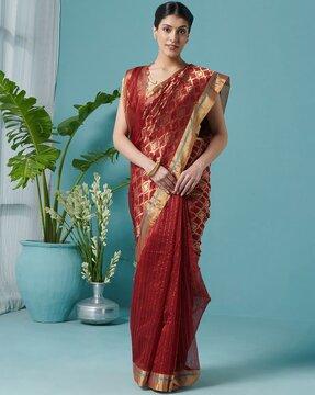 contrast border saree with tassels