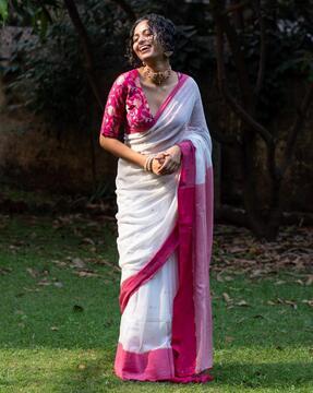 contrast border saree with tassels