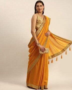 contrast border woven saree with tassels