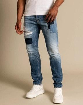 cool guy slim fit mid-wash jeans