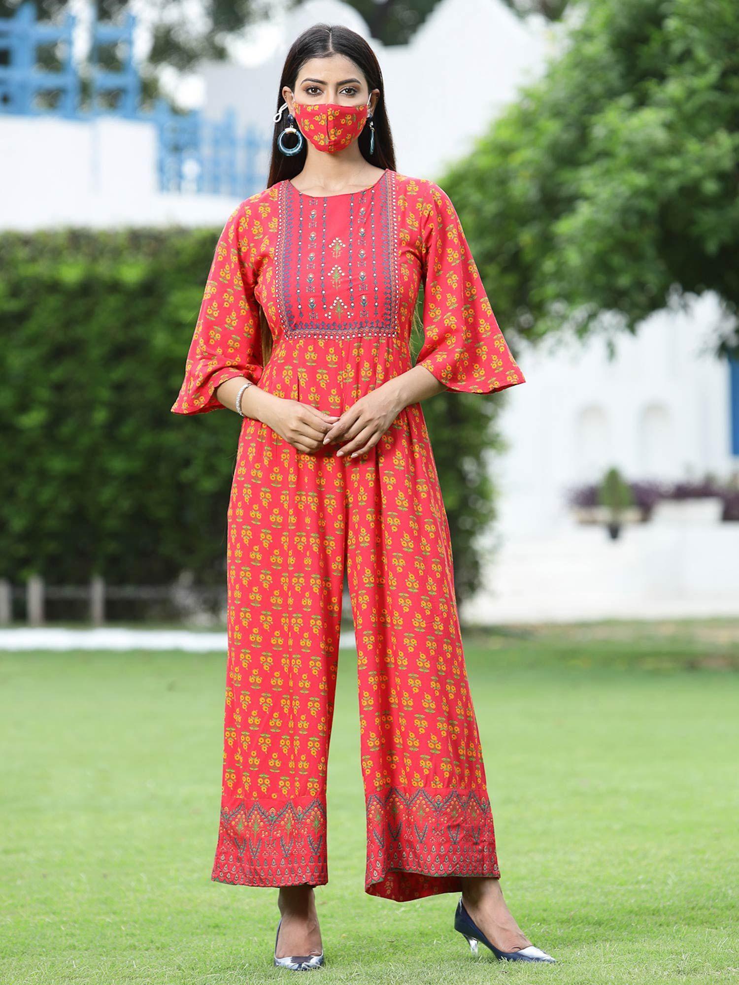 coral ethnic motif printed rayon flared jumpsuit.