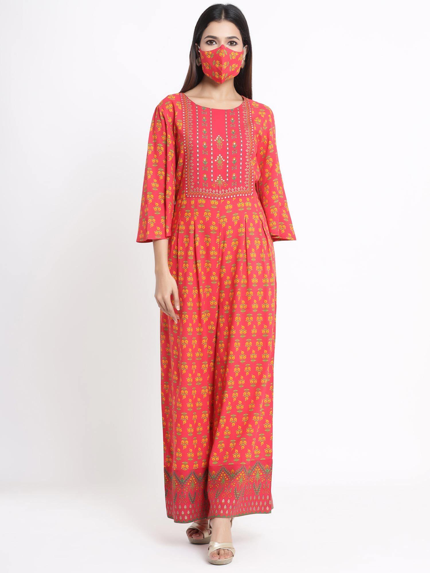 coral ethnic motif printed rayon flared jumpsuit.