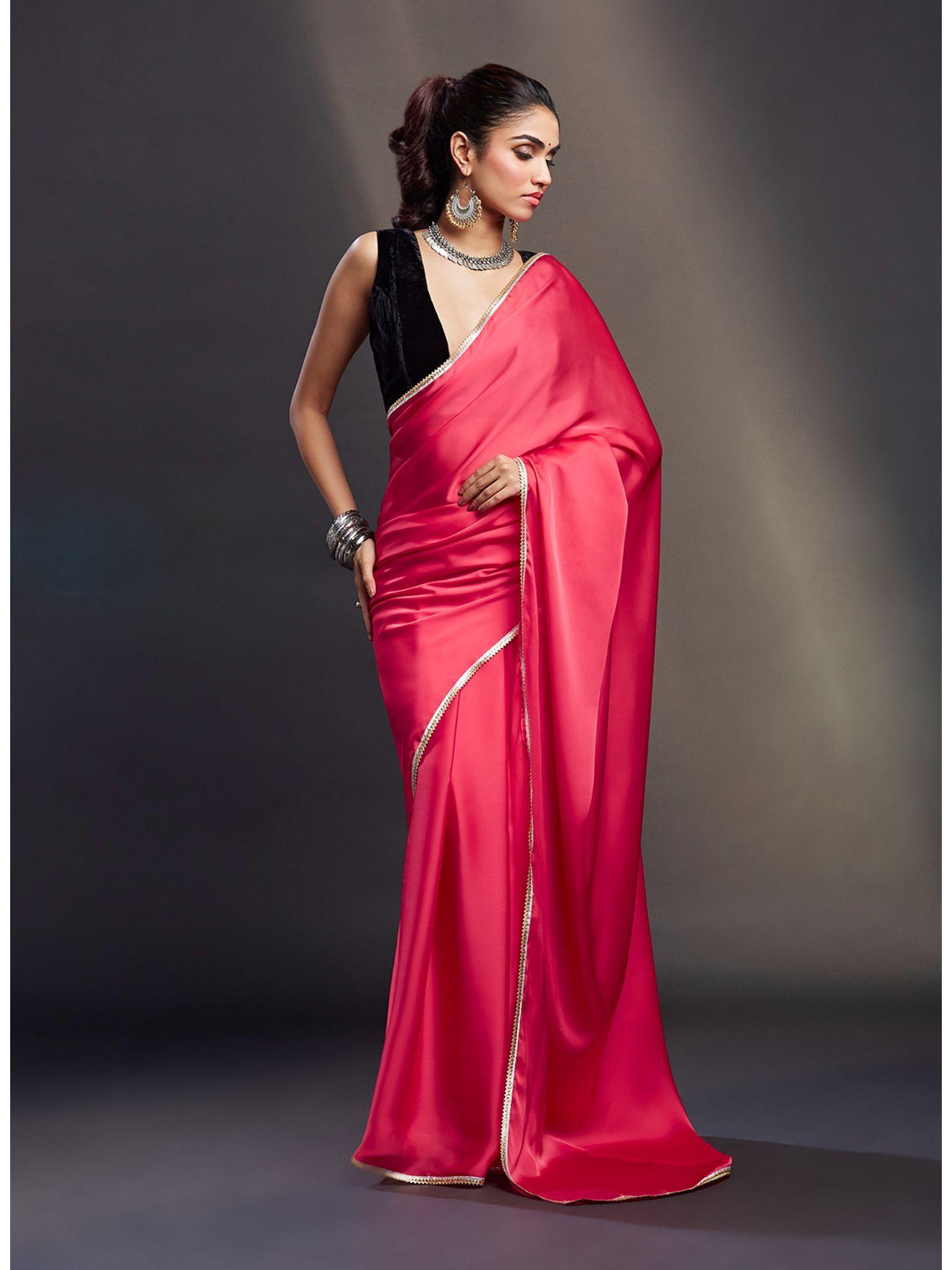 coral saree with stitched blouse