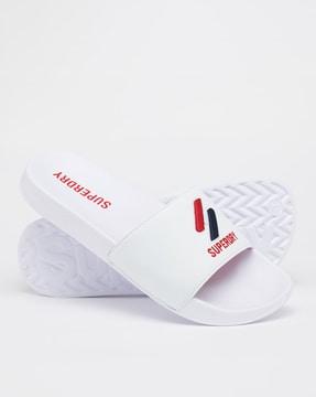 core pool sliders with brand print