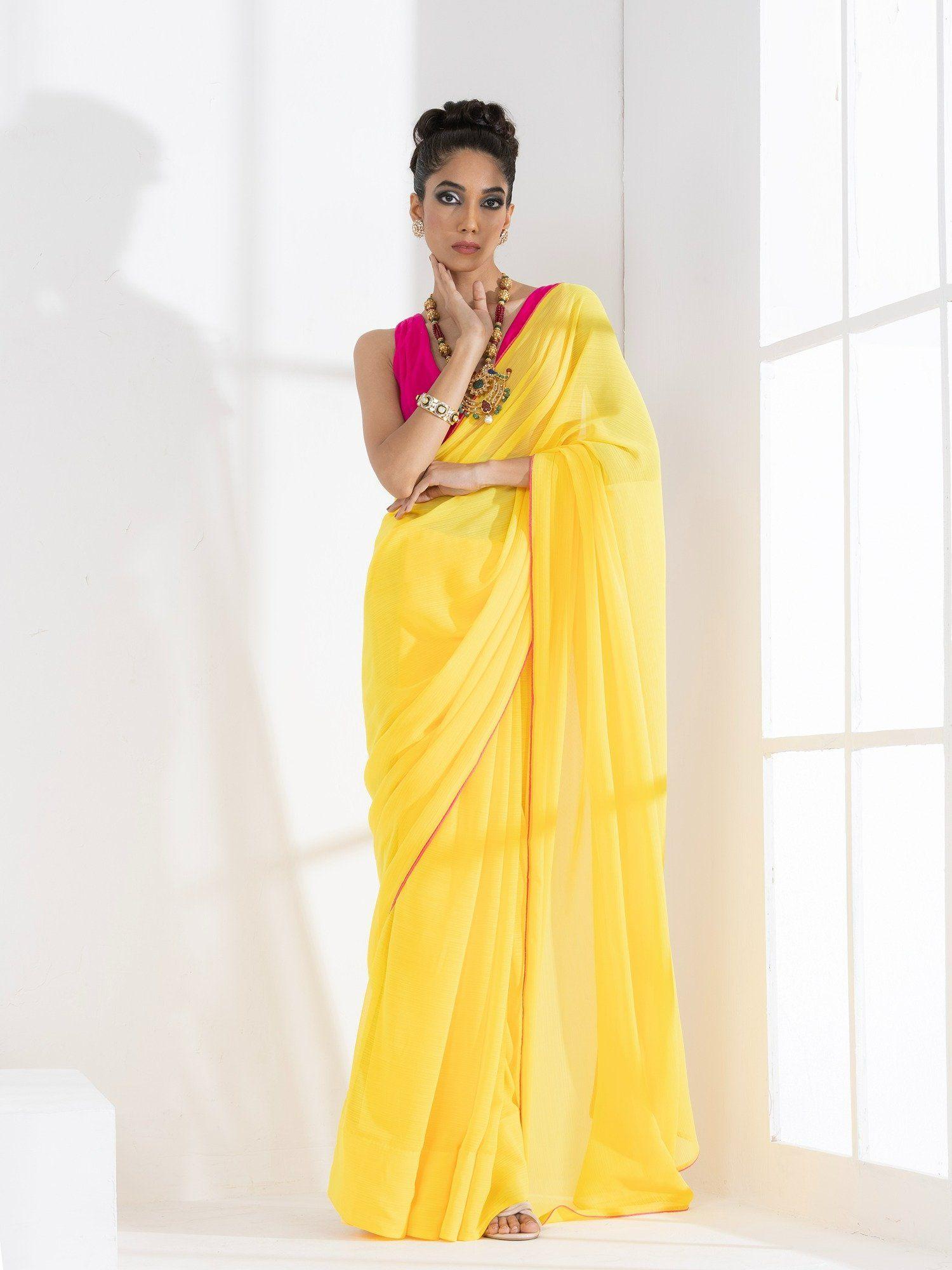 corn yellow textured chiffon saree & unstitched blouse with pink piping