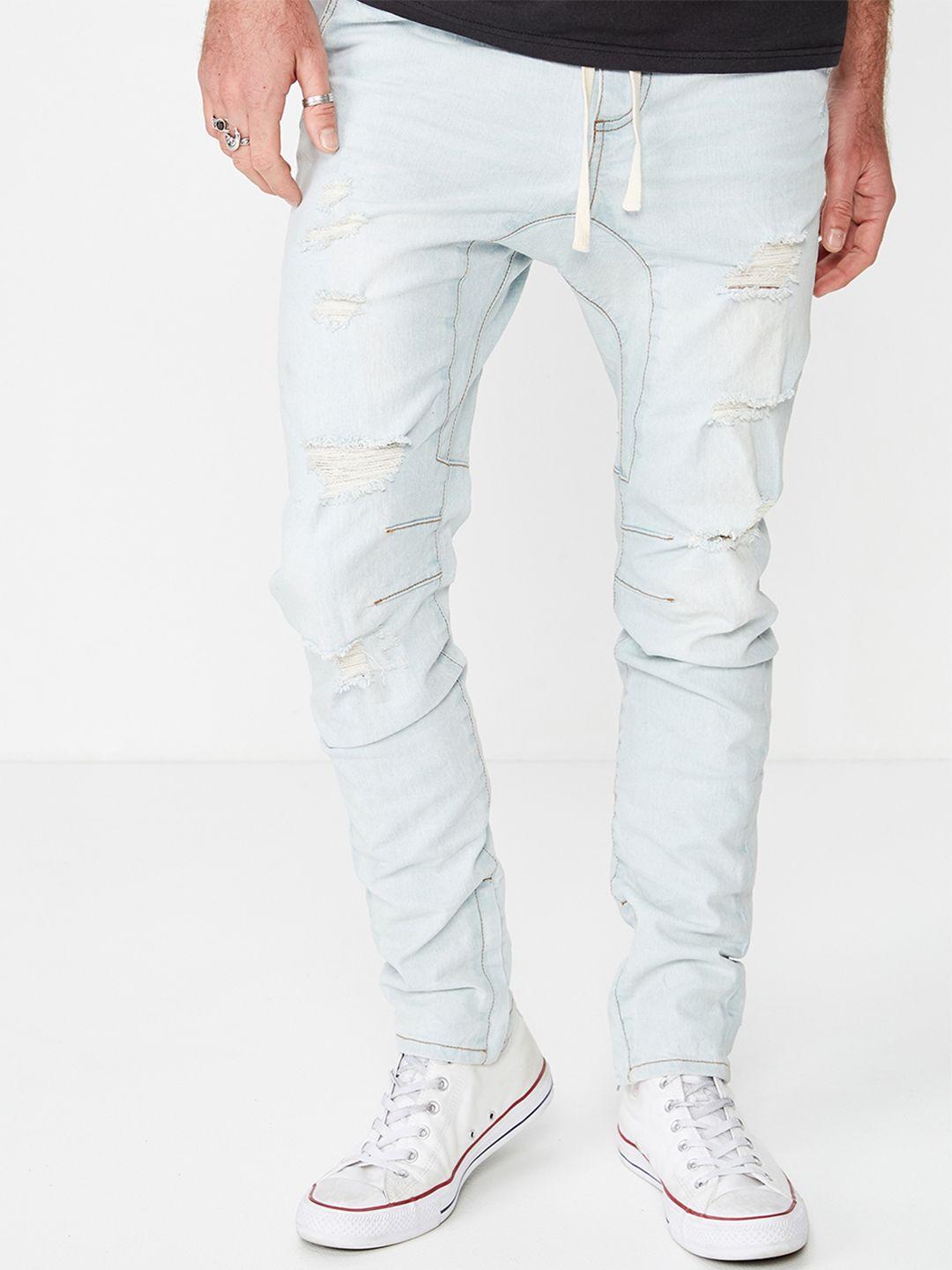 cotton on men blue slim fit mid-rise highly distressed stretchable jeans
