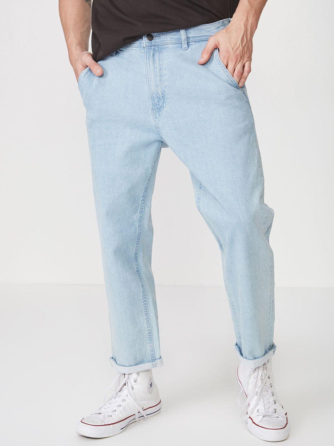 cotton on men blue slim fit solid regular trousers