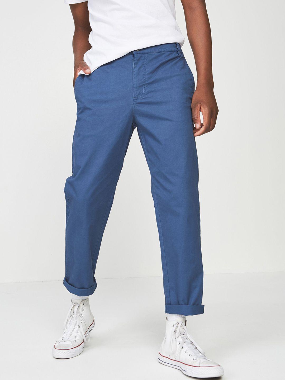 cotton on men blue slim fit solid regular trousers