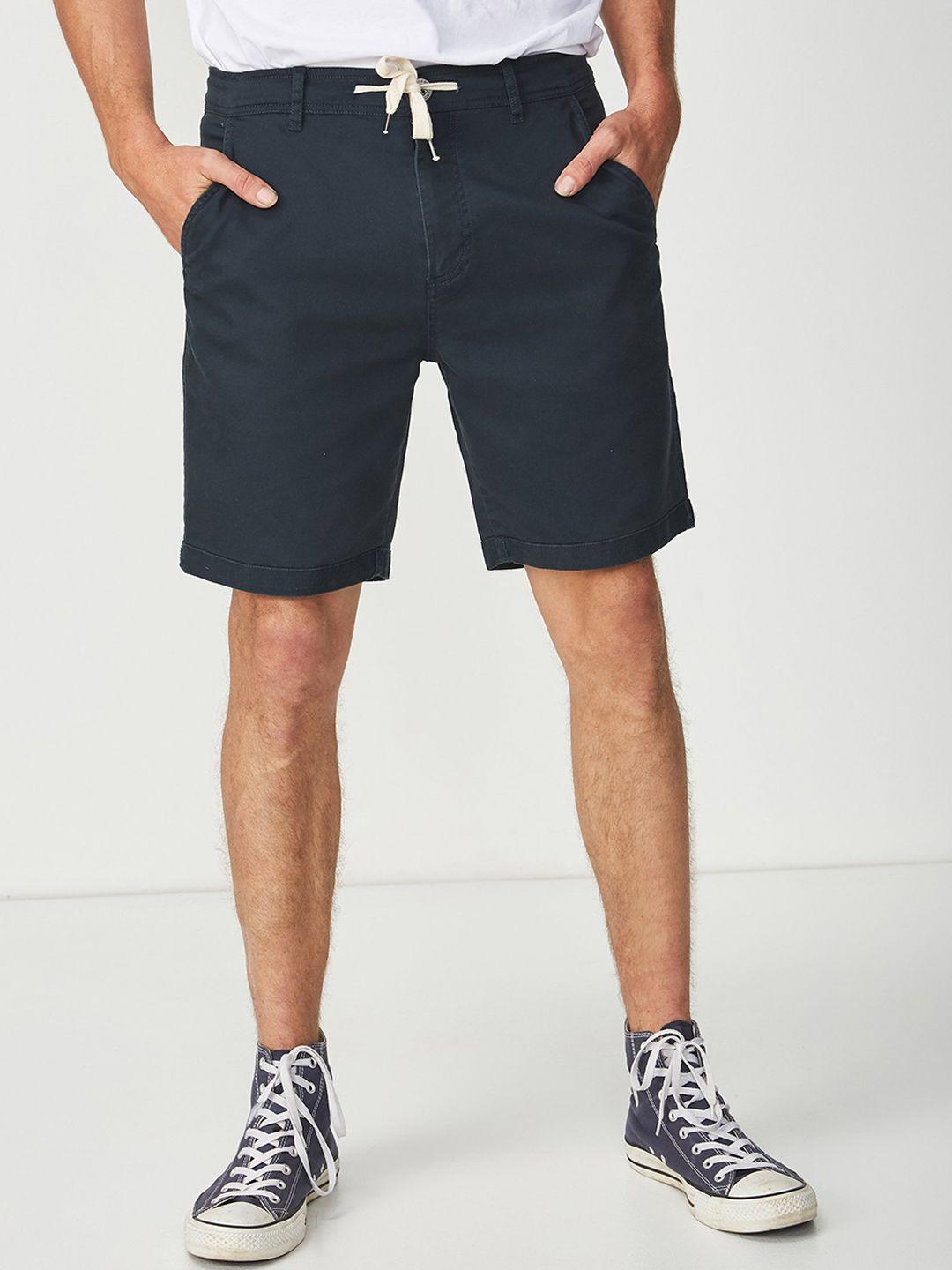 cotton on men navy blue solid regular fit regular shorts