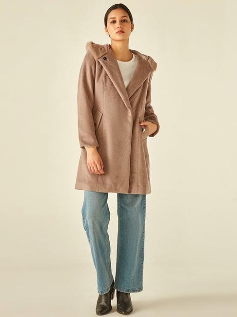 cover story beige trench coat