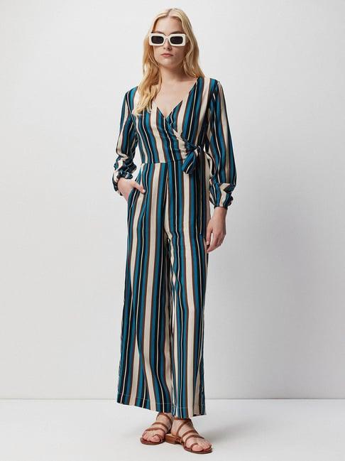 cover story blue striped jumpsuit