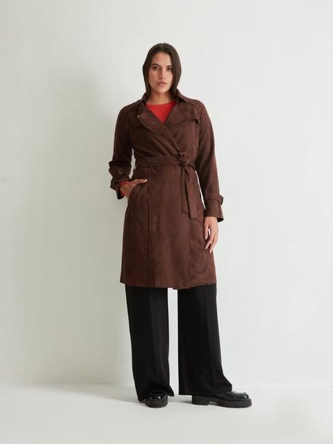 cover story brown trench coat