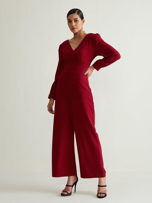 cover story maroon jumpsuit
