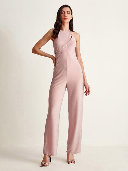 cover story pink jumpsuit