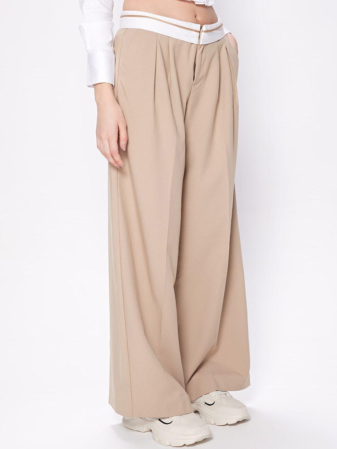 cover story women beige loose fit mid-rise pleated trousers