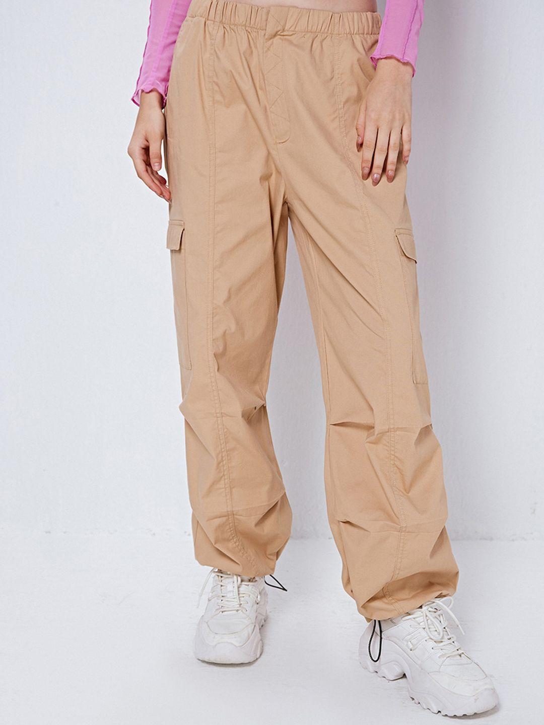 cover story women beige mid rise loose fit cargos trousers