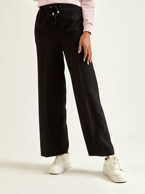 cover story black regular fit mid rise pants