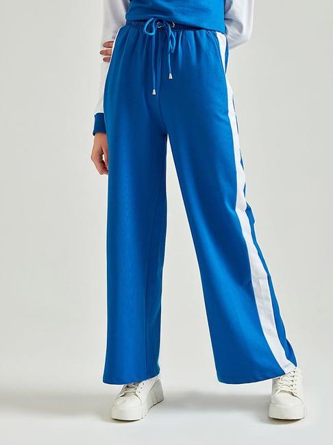 cover story blue regular fit drawstring trousers