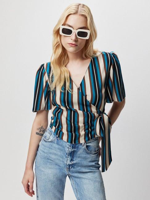 cover story blue striped top
