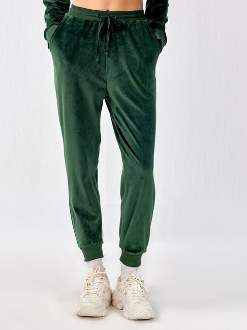 cover story green regular fit mid rise joggers