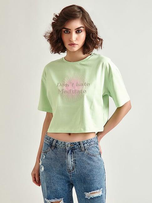 cover story green round neck printed top
