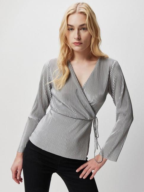 cover story grey striped top