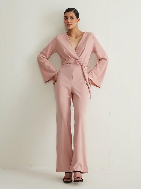 cover story pink jumpsuit