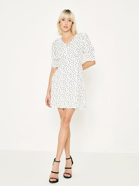 cover story white polka dot skater dress