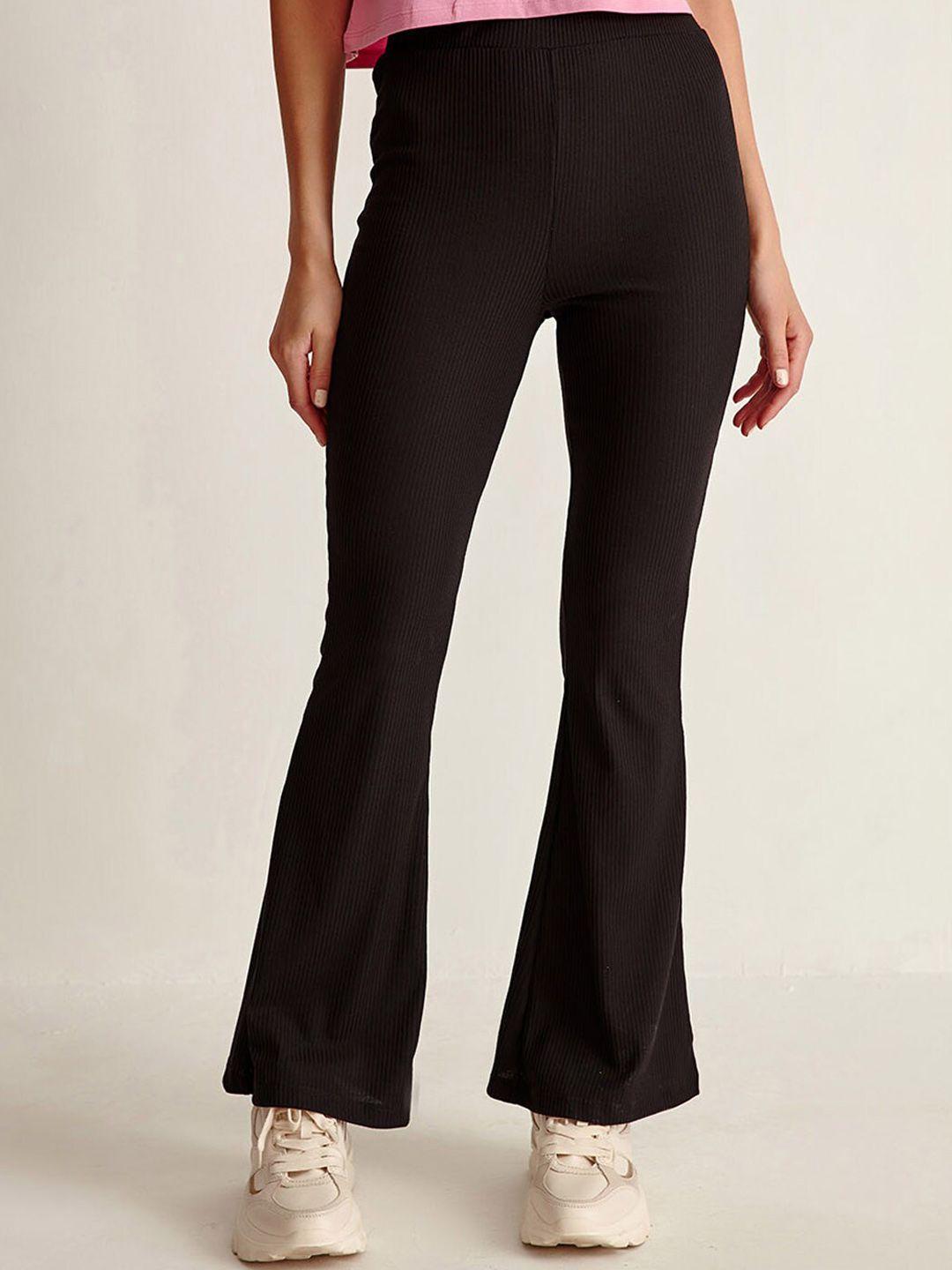 cover story women black flared trousers