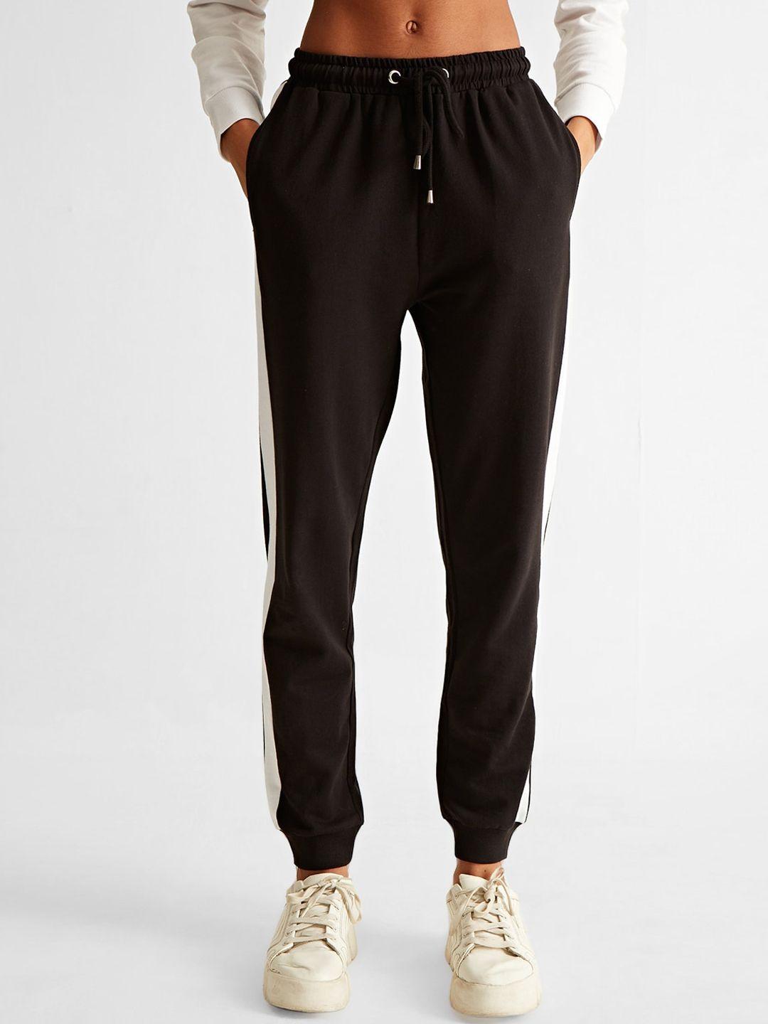 cover story women black mid-rise joggers trousers