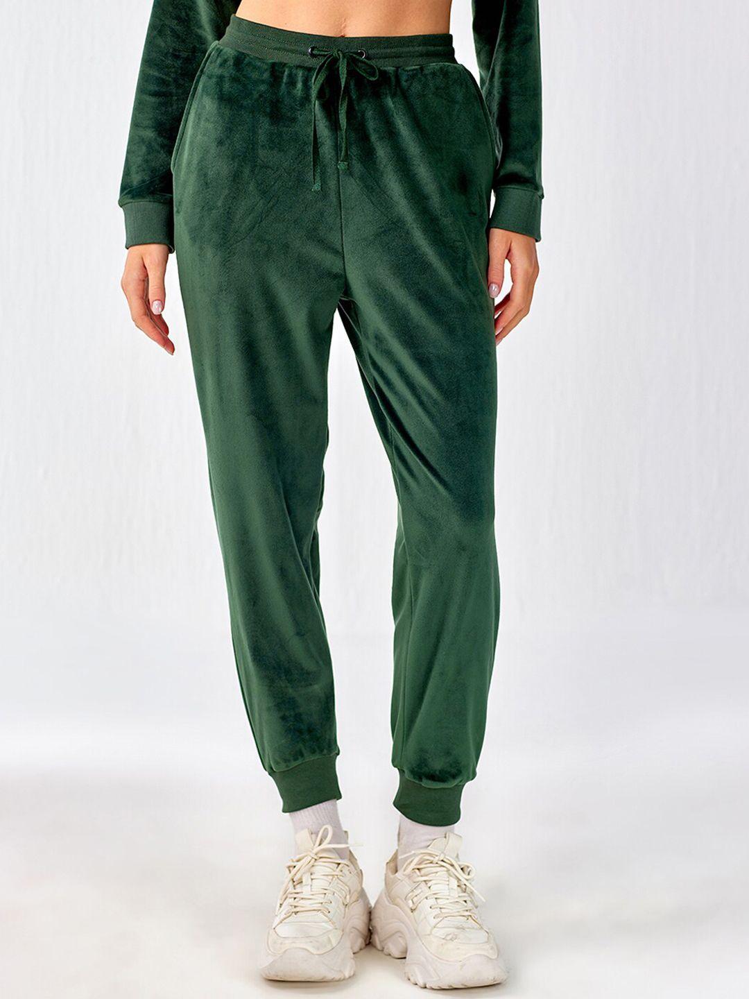 cover story women green joggers trousers