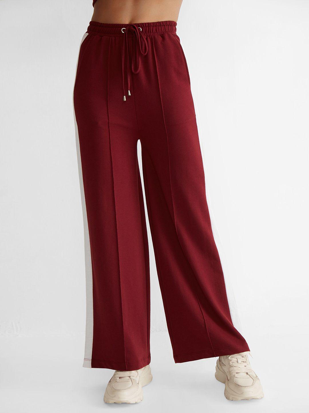 cover story women solid bootcut track pants