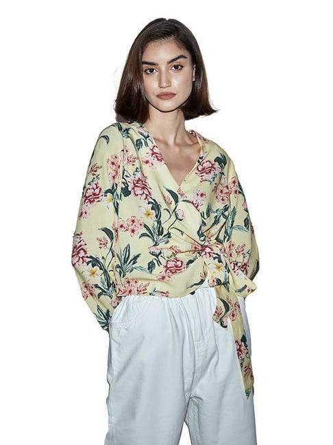 cover story yellow floral print top