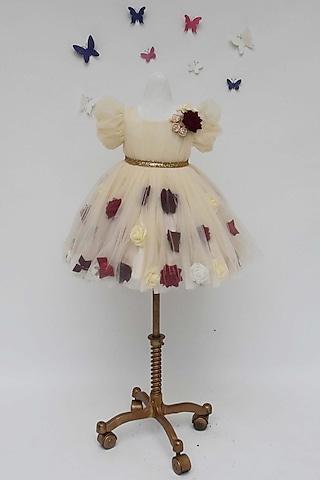 cream dress with floral work for girls