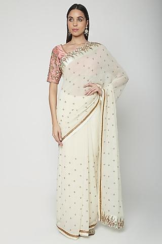 cream embroidered saree set