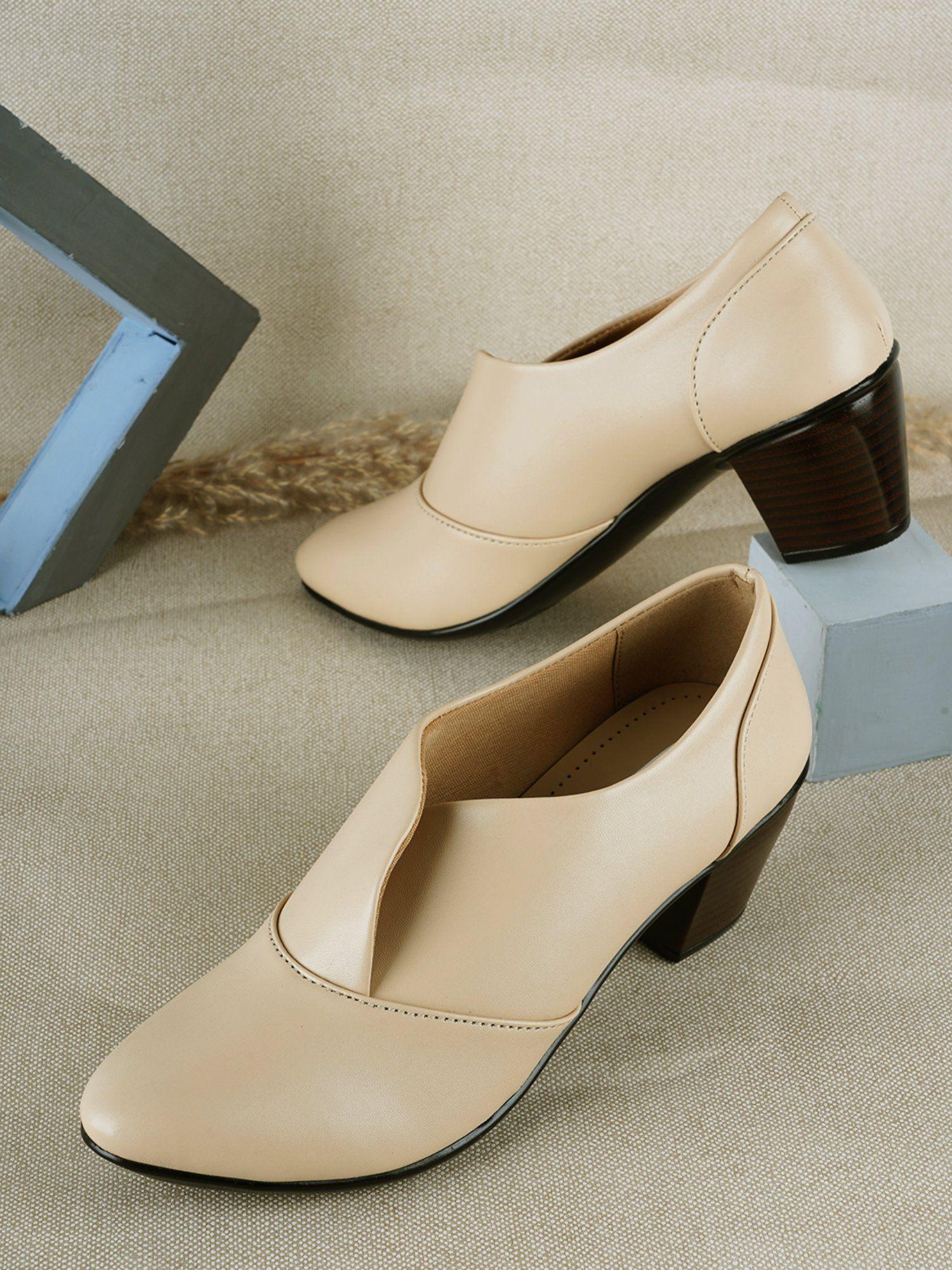 cream pointed toe party wear pumps