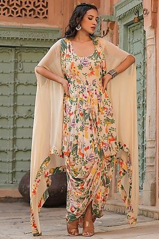 cream printed gown with cape
