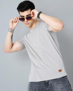 crew-neck t-shirt with brand leather patch