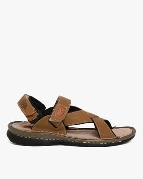 criss-cross strap sandals with velcro fastening