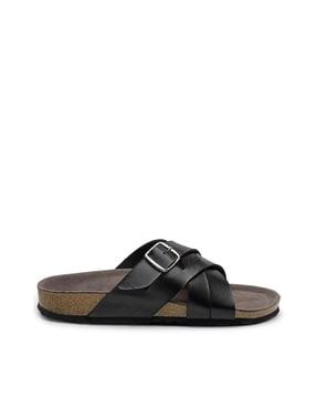criss-cross strapped slip-on sandals