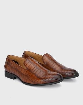 croc-embossed slip-on shoes