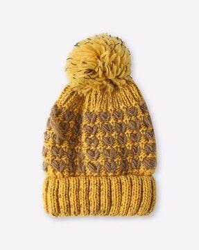 crochet-knit beanie with pom-pom